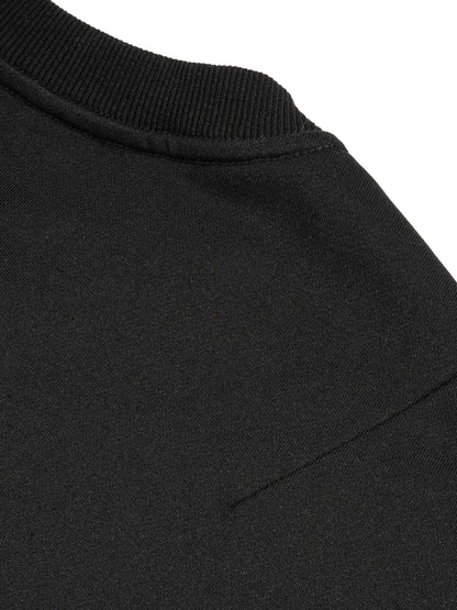 Black French terry crew neck ribbing and shoulder seam close-up