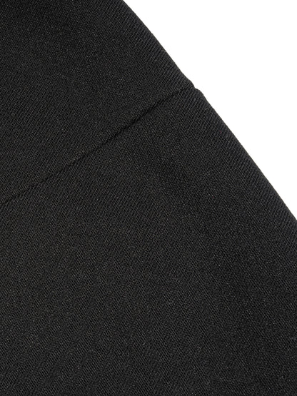 Black French terry fabric close-up with side seam detail