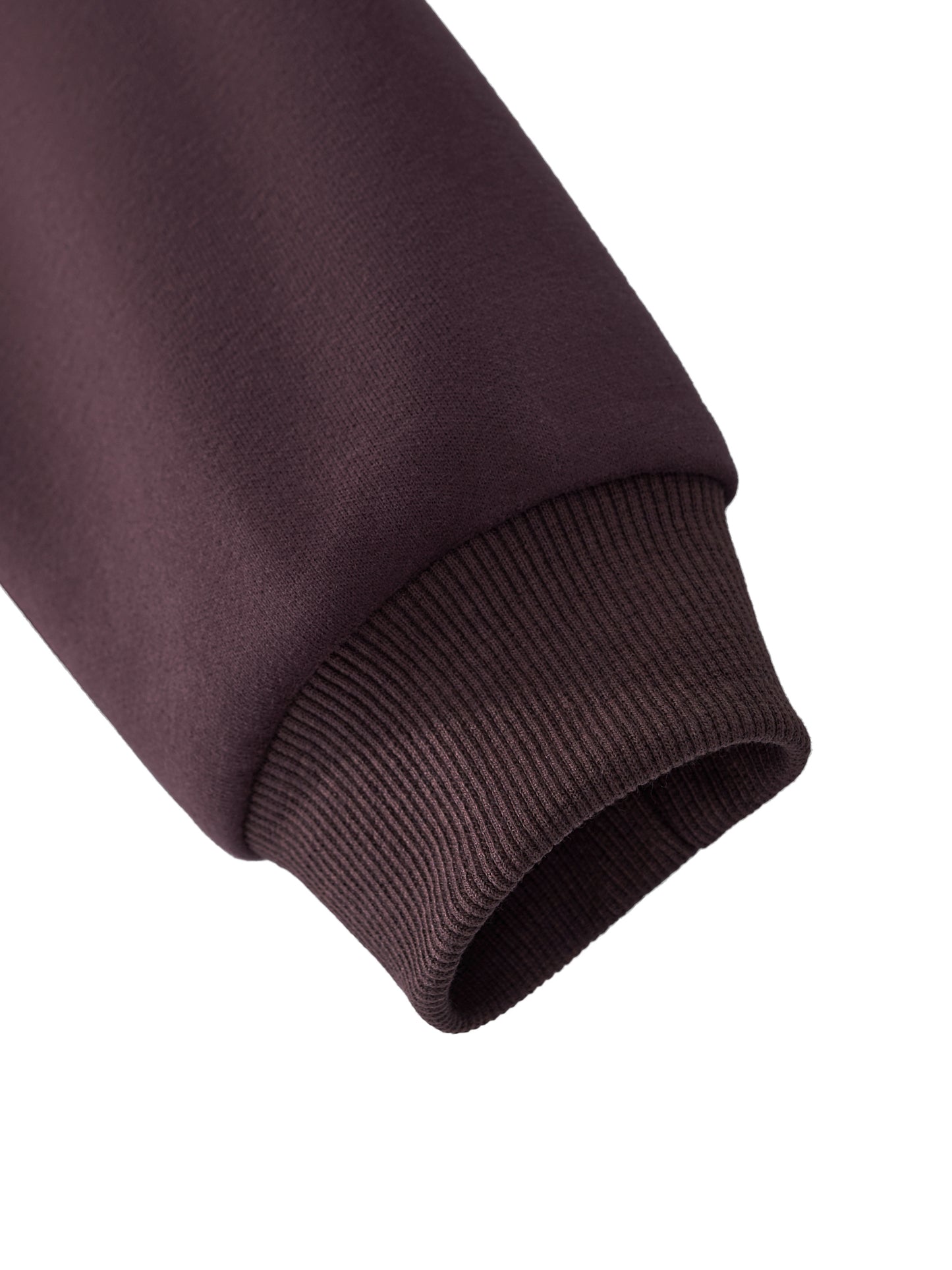 Women’s cropped hoodie sleeve cuff in dark reddish purple with ribbed knit