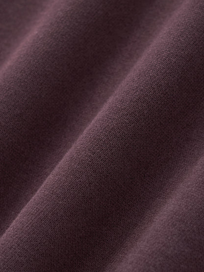 Women’s cropped hoodie fabric in dark reddish purple with fine knit texture