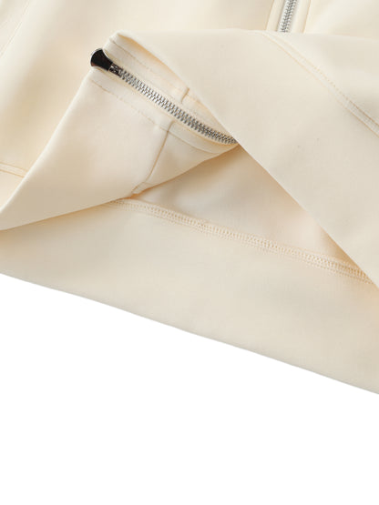 Cream raglan zip hoodie close-up of silver zipper and pocket area
