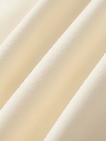 Cream raglan zip hoodie fabric close-up with seam lines