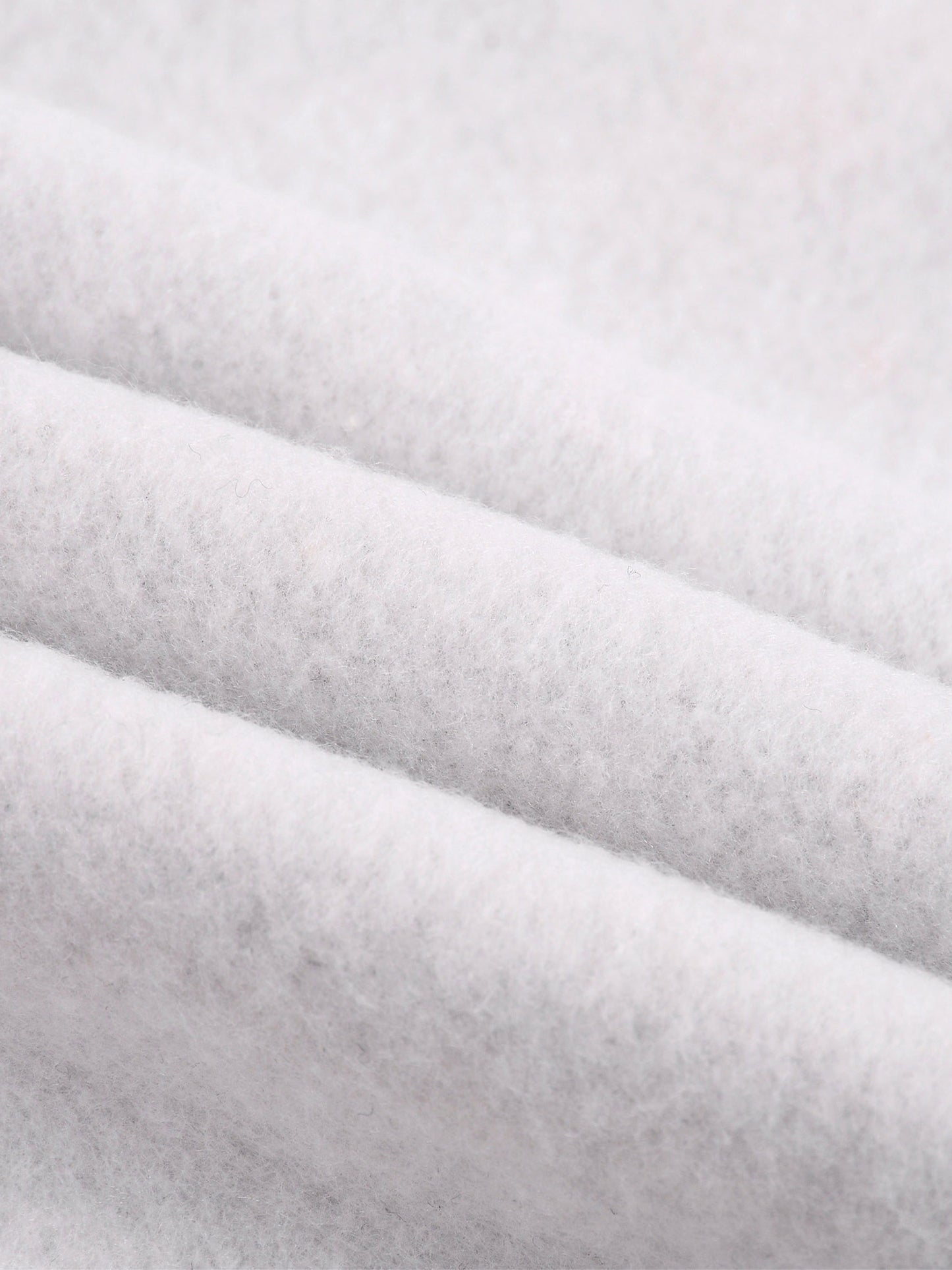 Heather gray fleece fabric close-up with soft knit texture
