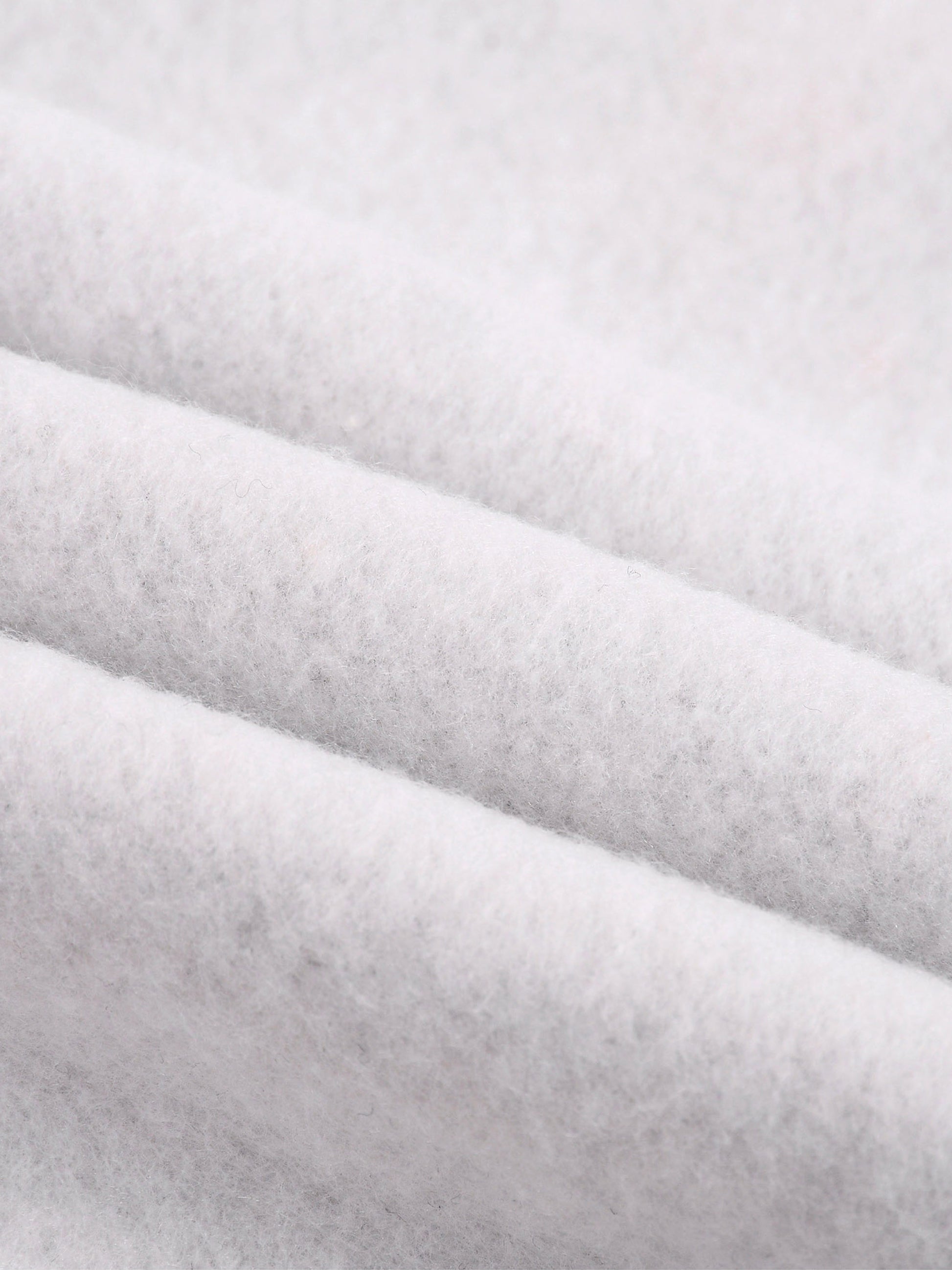 Heather gray fleece fabric close-up with soft knit texture