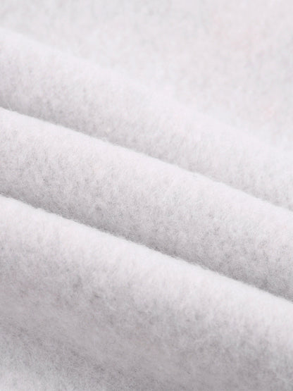 Heather gray fleece fabric close-up with soft knit texture