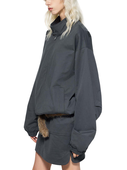 Dark bomber jacket with stand collar, zip front, chest pocket, ribbed hem