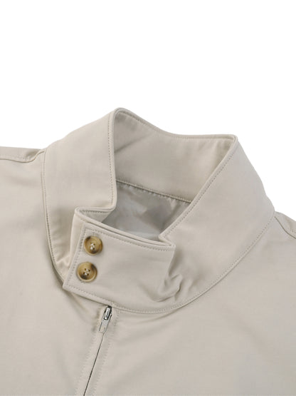 Beige stand collar bomber jacket with snap button placket and inner collar detail