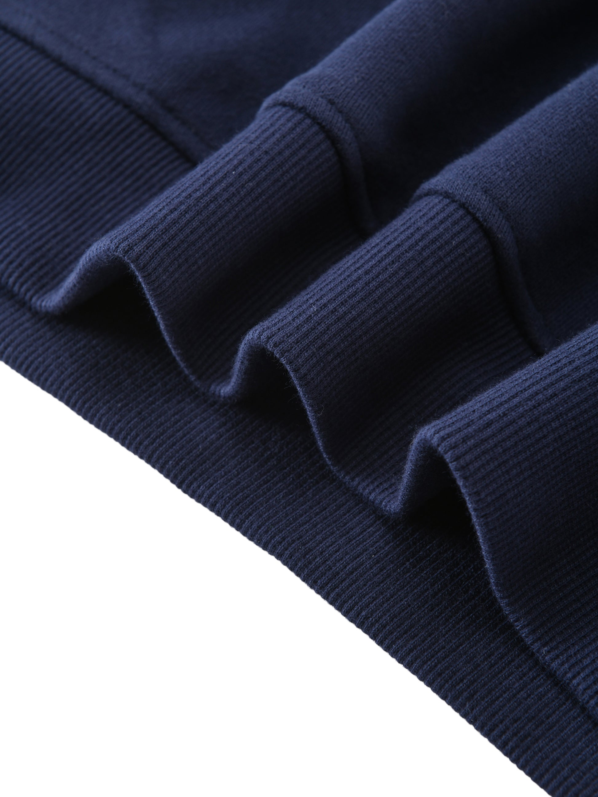 Kids fleece crewneck, navy, ribbed cuffs texture close-up