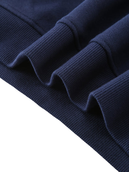 Kids fleece crewneck, navy, ribbed cuffs texture close-up