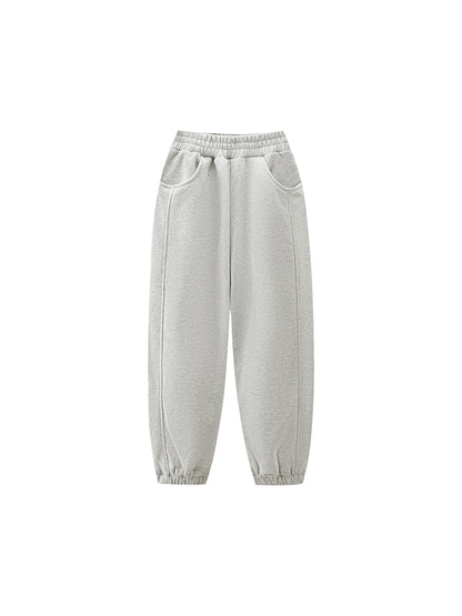 Kids fleece jogger in light gray, elastic waistband with cuffed legs, front/side view
