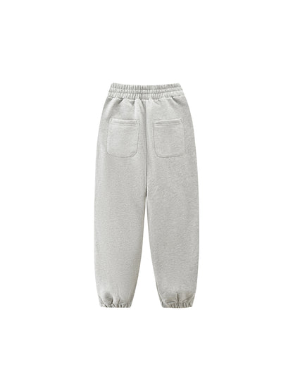 Kids fleece jogger in light gray with elastic waistband and side pockets, cuffed hem