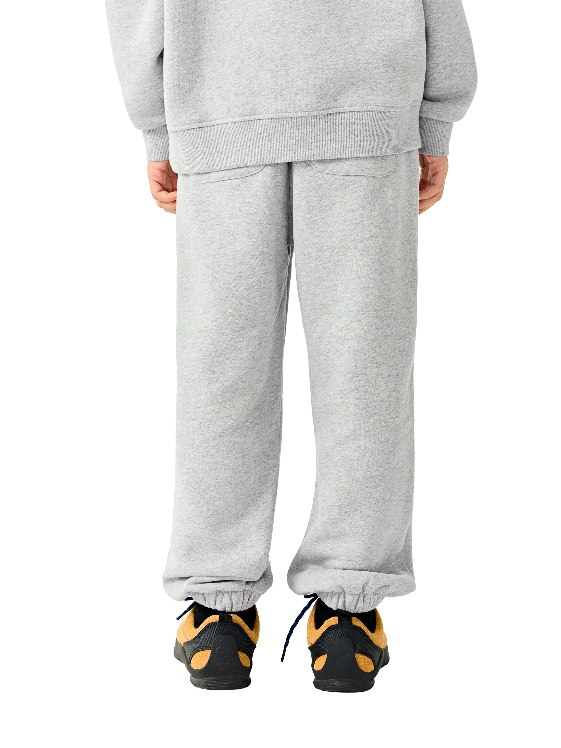 Kids fleece jogger in light gray worn, relaxed leg fit with elastic cuffs and waistband
