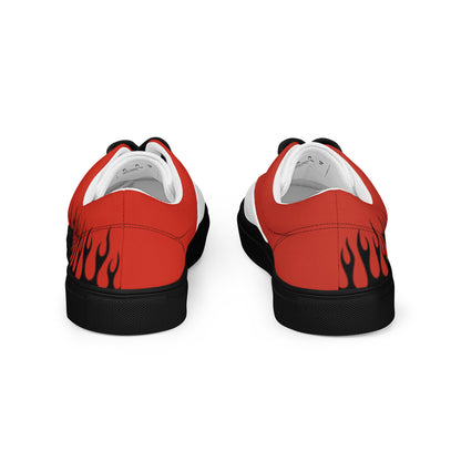 Back view of red and white canvas sneakers with black flame detail on the heel