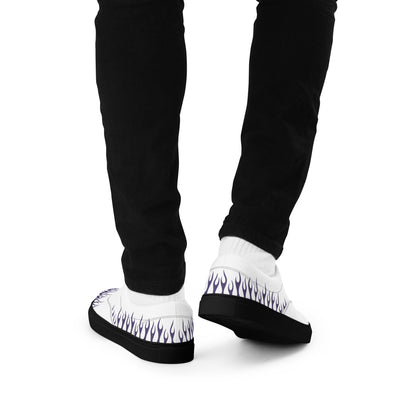White canvas sneaker with violet flame print and black sole on black pant legs