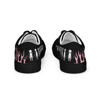Black canvas sneaker heel view with pink flame print and white collar lining