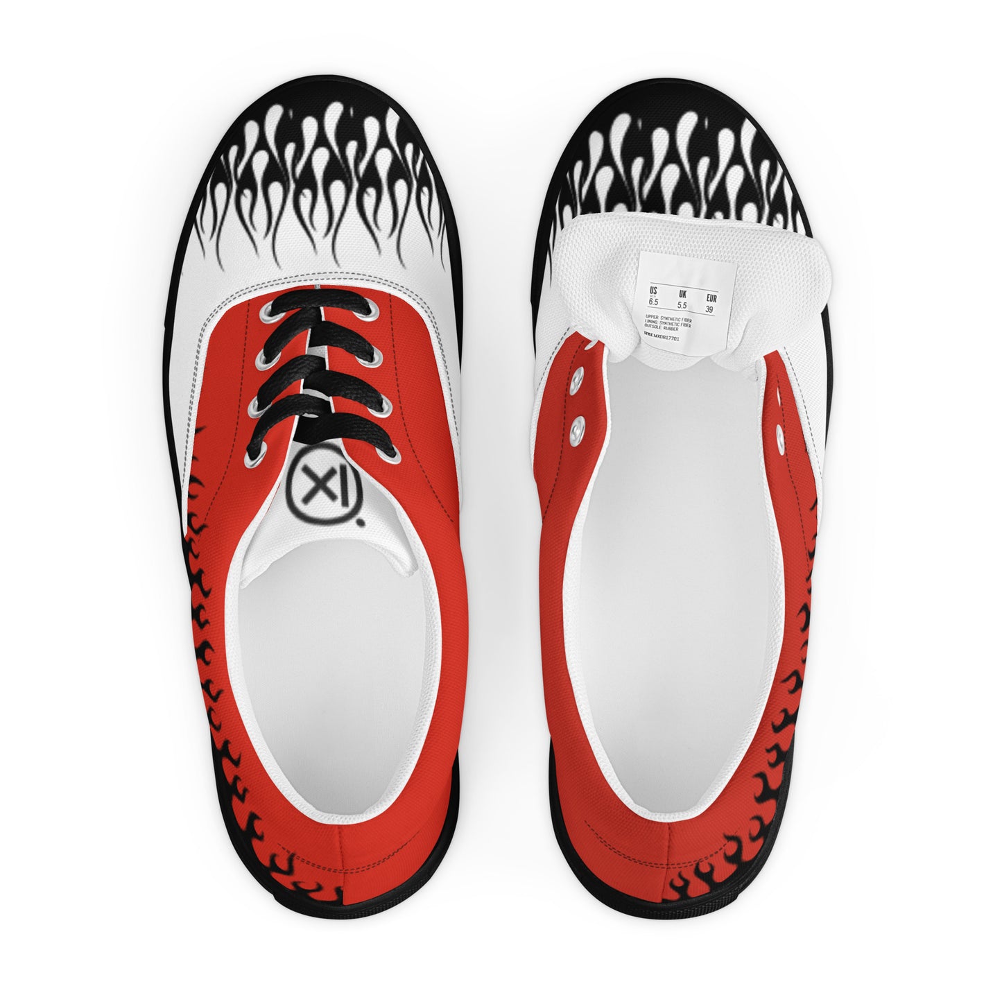 Pair of red-and-white canvas sneakers showing flame-print toe panels and a size label