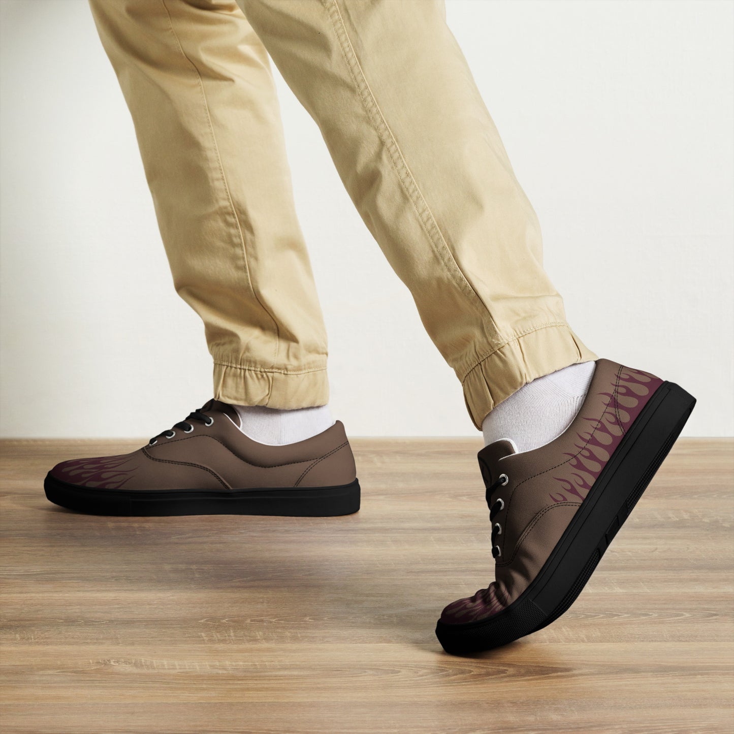 Canvas sneakers with brown upper, burgundy flame print, black laces, black outsole