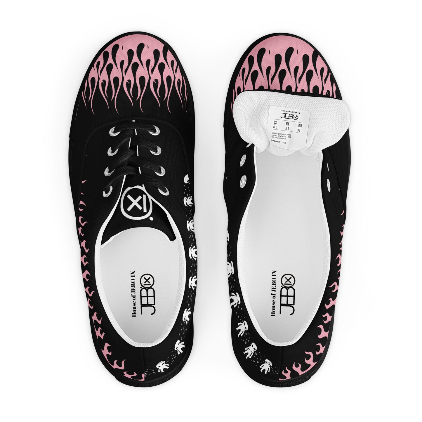 Black canvas sneaker pair top view with pink flame pattern and white tongue labels