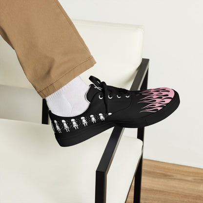 Black canvas sneaker on chair with pink flame print, lace-up, white sole