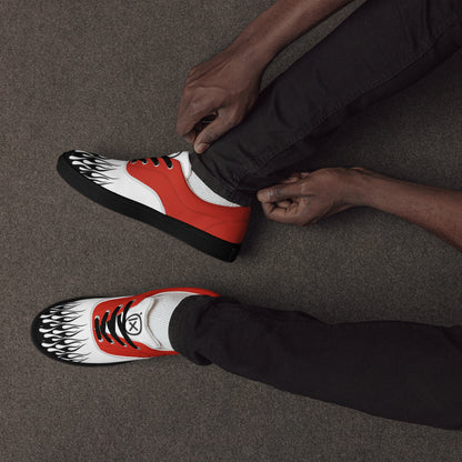Canvas sneaker in red, white, and black with flame graphic on toe and side