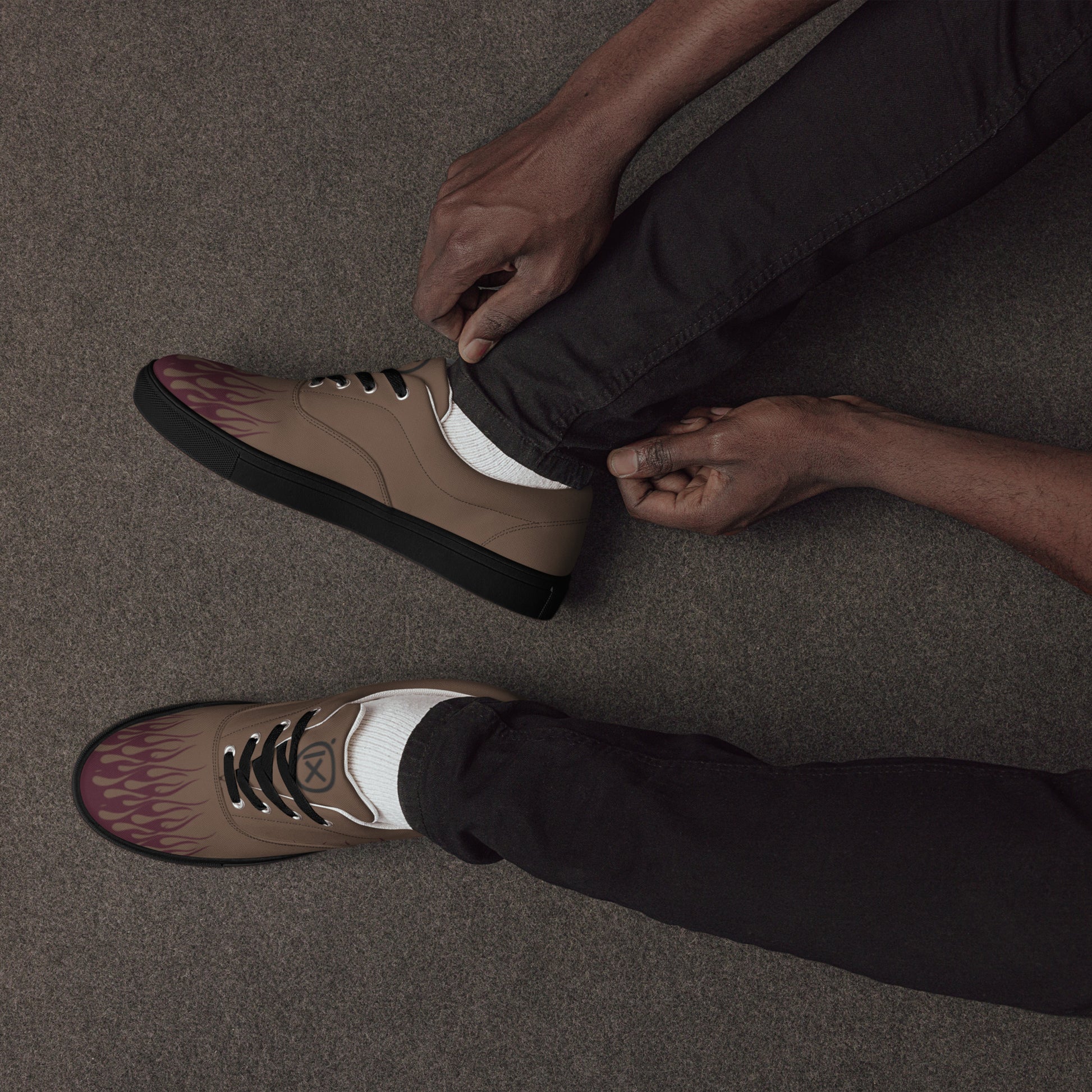 Brown canvas sneakers with burgundy flame graphic, black laces, black sidewall sole