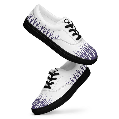 White canvas low-top sneakers with purple flame print, black laces and sole.