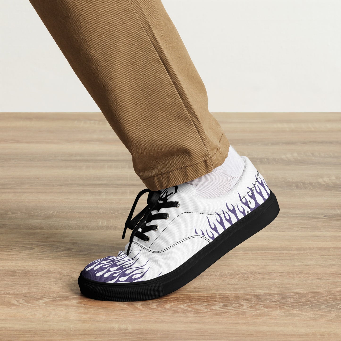 White canvas sneaker with violet flame design, black laces and black rubber sole