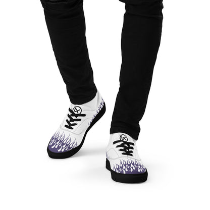 White canvas sneaker with violet flame print on sides and heel; black sole