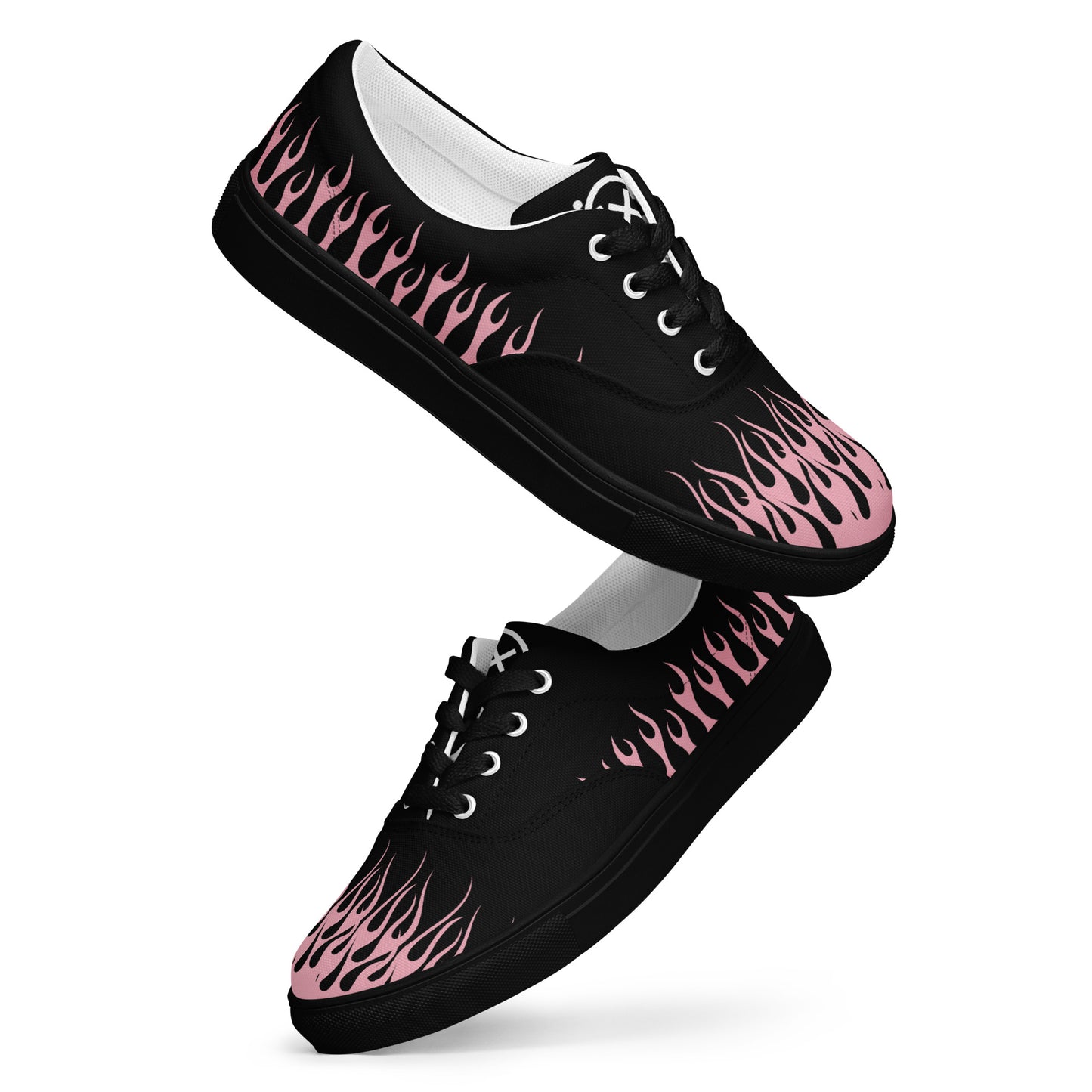 Black canvas sneaker with pink flame print, white lining, lace-up front and rubber sole