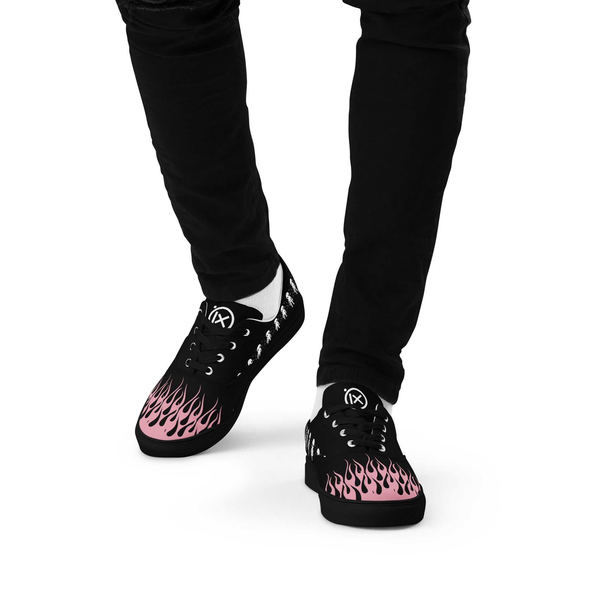 Black canvas sneakers with pink flame graphic, lace-up front, black laces, rubber sole