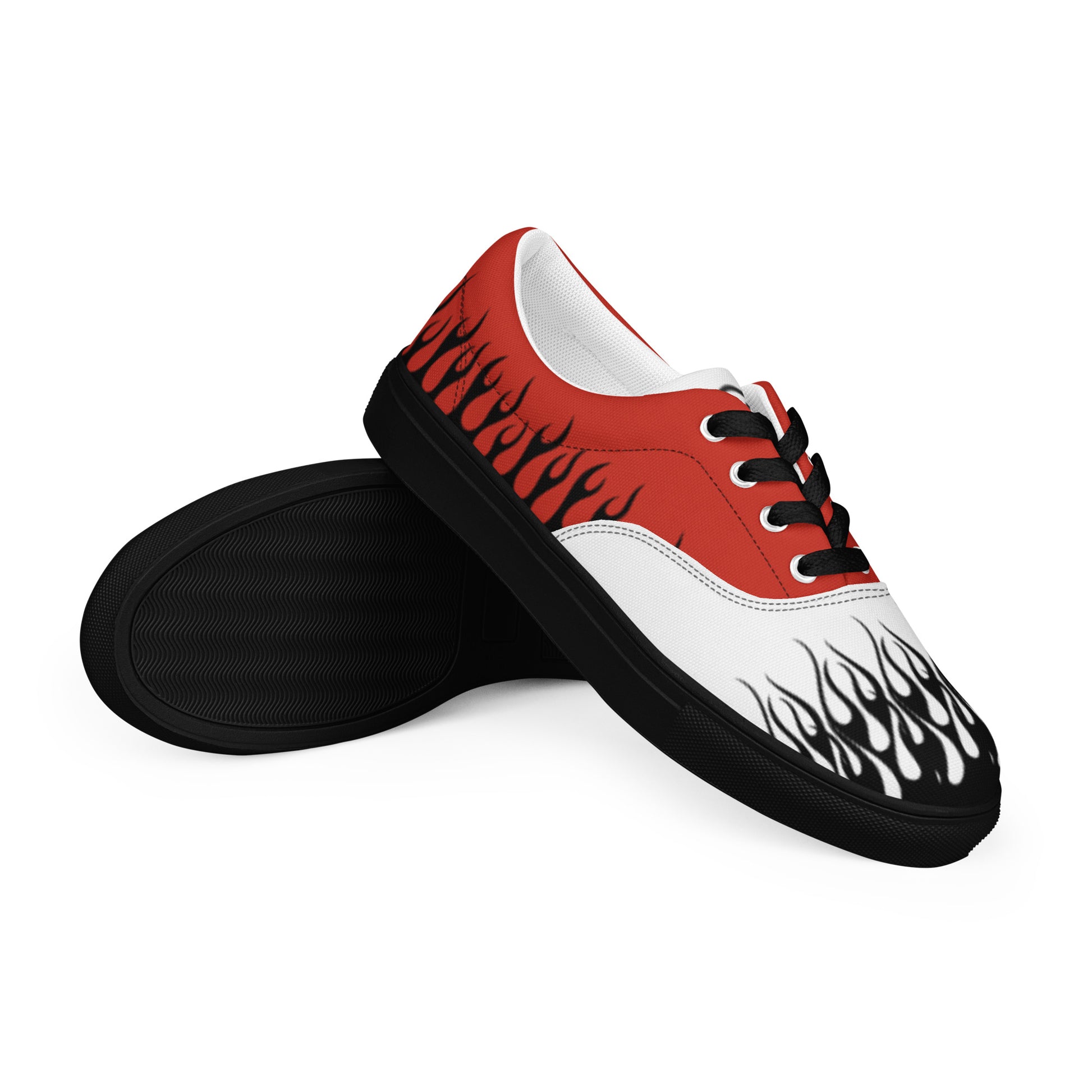 Side view of red and white low-top sneakers with flame print and black rubber sole