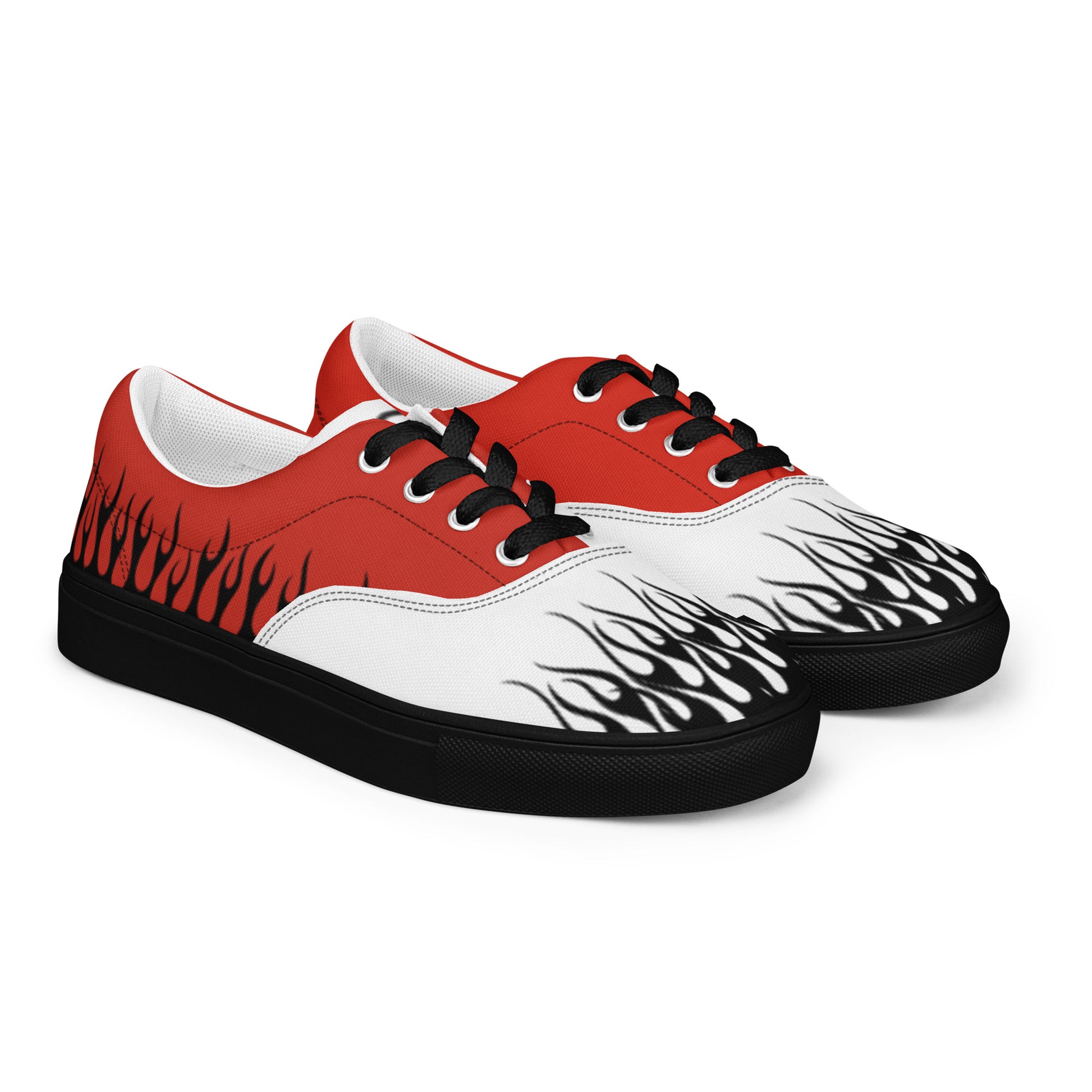 Side view of red-and-white canvas sneaker with flame graphics and black rubber sole