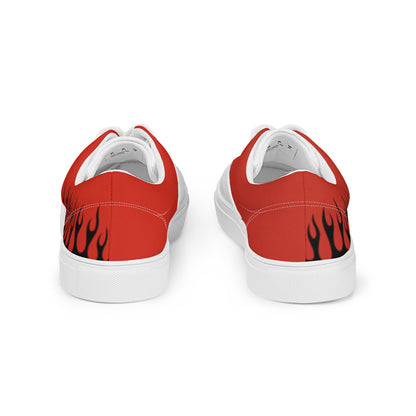 Back view of red canvas sneakers with flame graphics on the heel and white midsoles