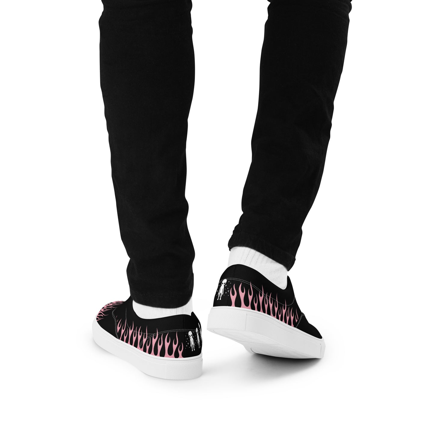 Black canvas sneakers with pink flame print along heel and white soles