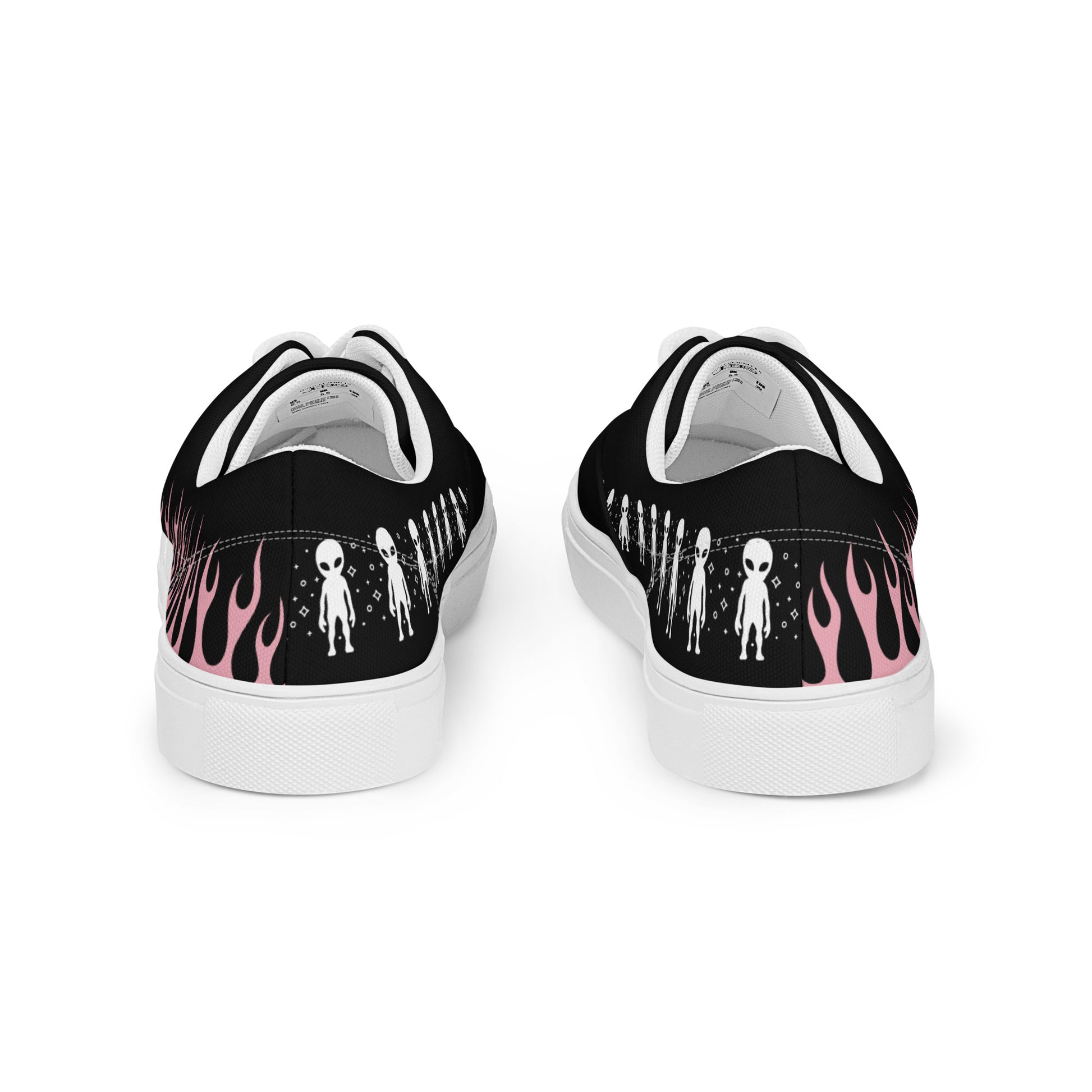 Black canvas sneaker back view with pink flame print and white outsole