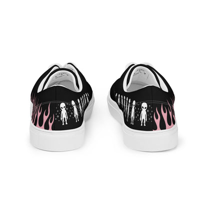 Black canvas sneaker back view with pink flame print and white outsole