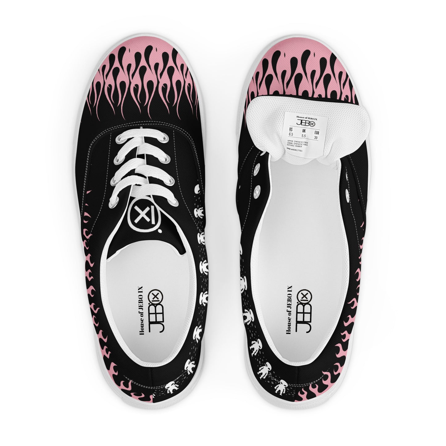 Black canvas sneaker top view with pink flame print and visible tongue label