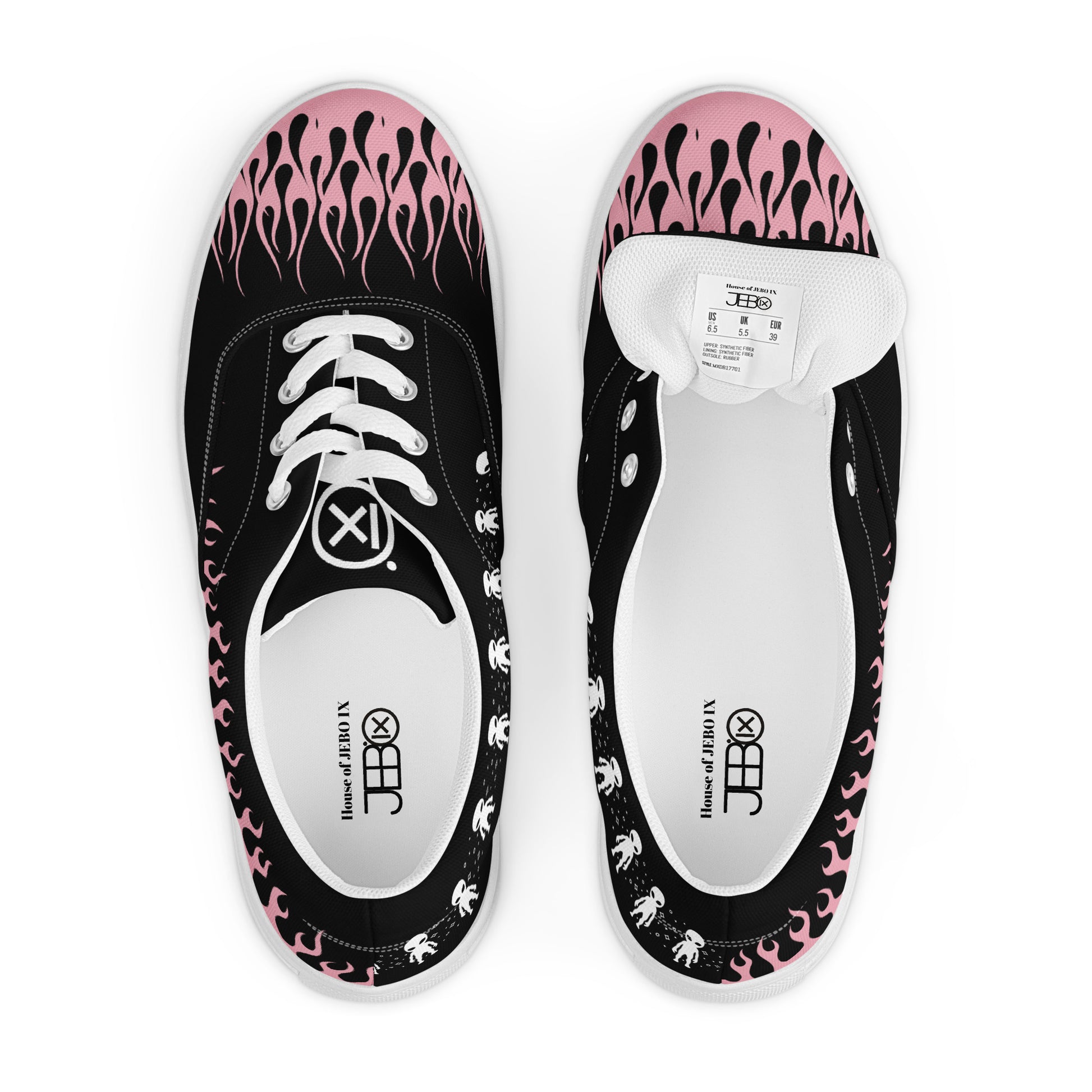 Black canvas sneaker top view with pink flame print and visible tongue label
