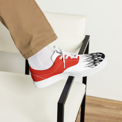 Canvas sneaker red and white with black flame print and white laces, side view