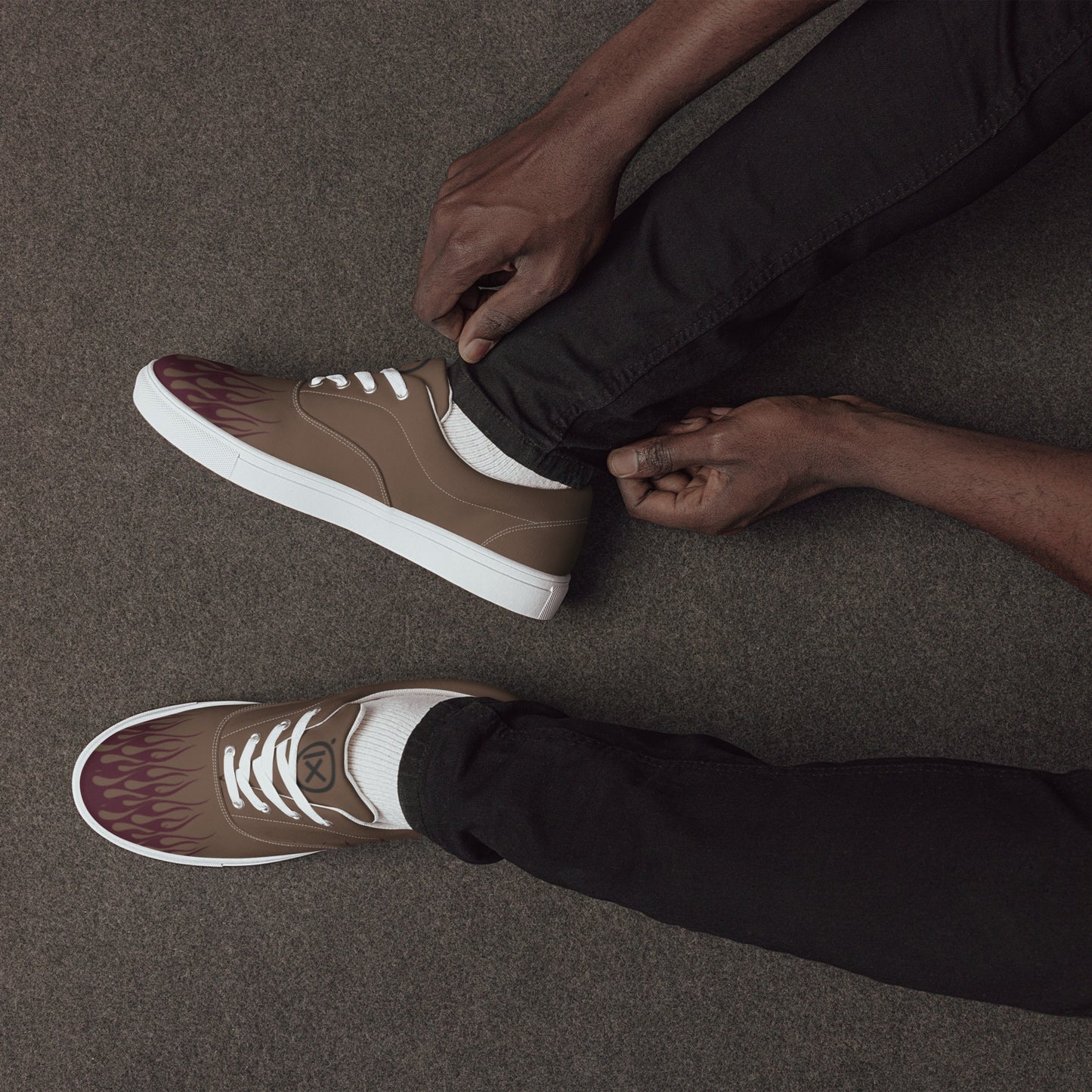 Brown canvas sneakers with burgundy flame graphic, white laces, white sidewall sole