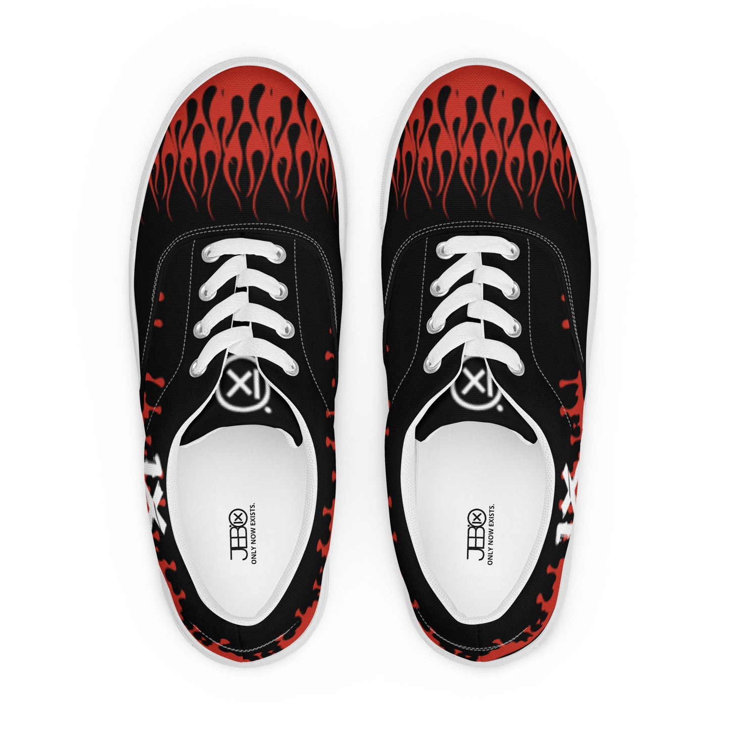 Black canvas sneakers with red flame pattern on toe area, white laces, top view pair.