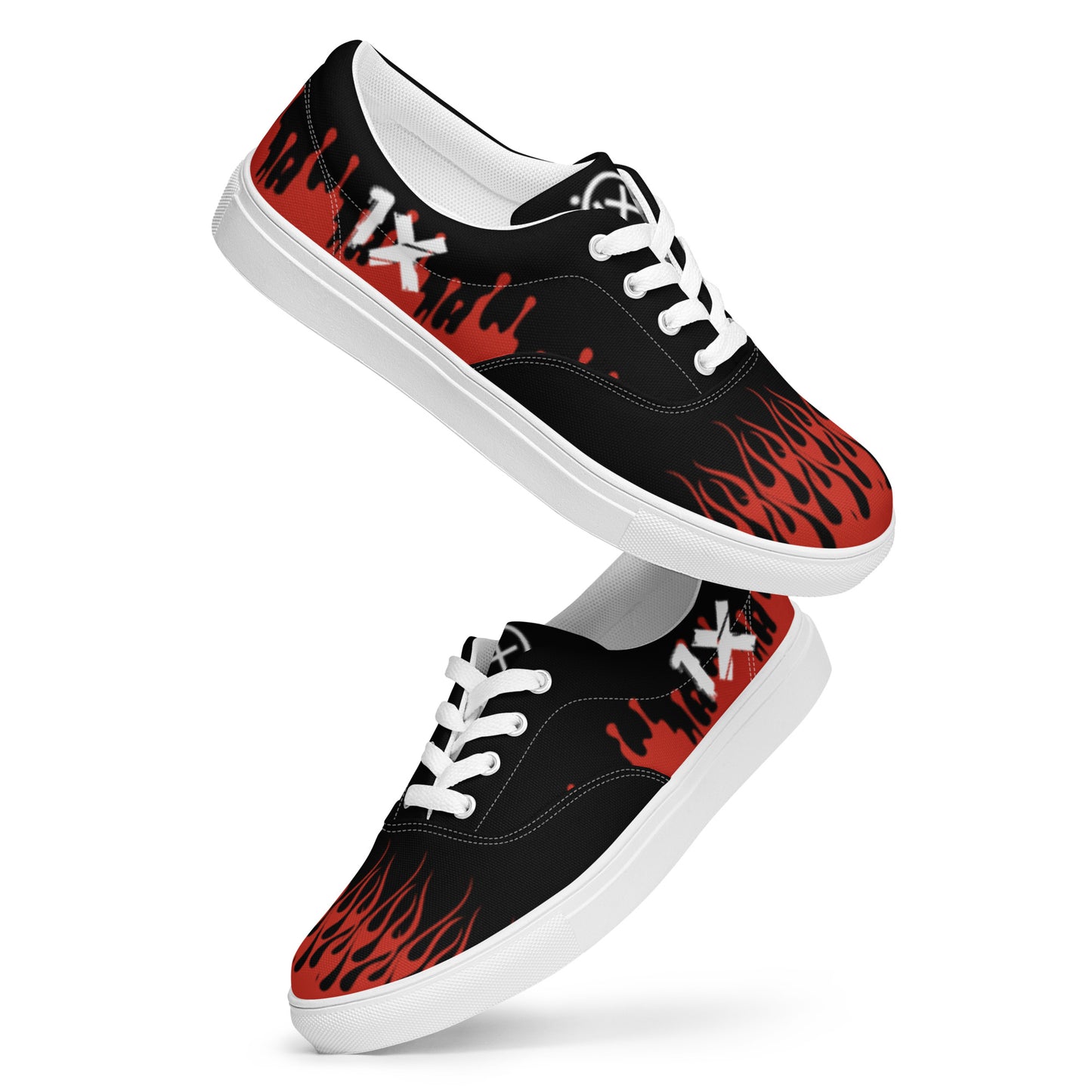 Canvas sneaker in black with red flame graphic, white laces and white rubber sole