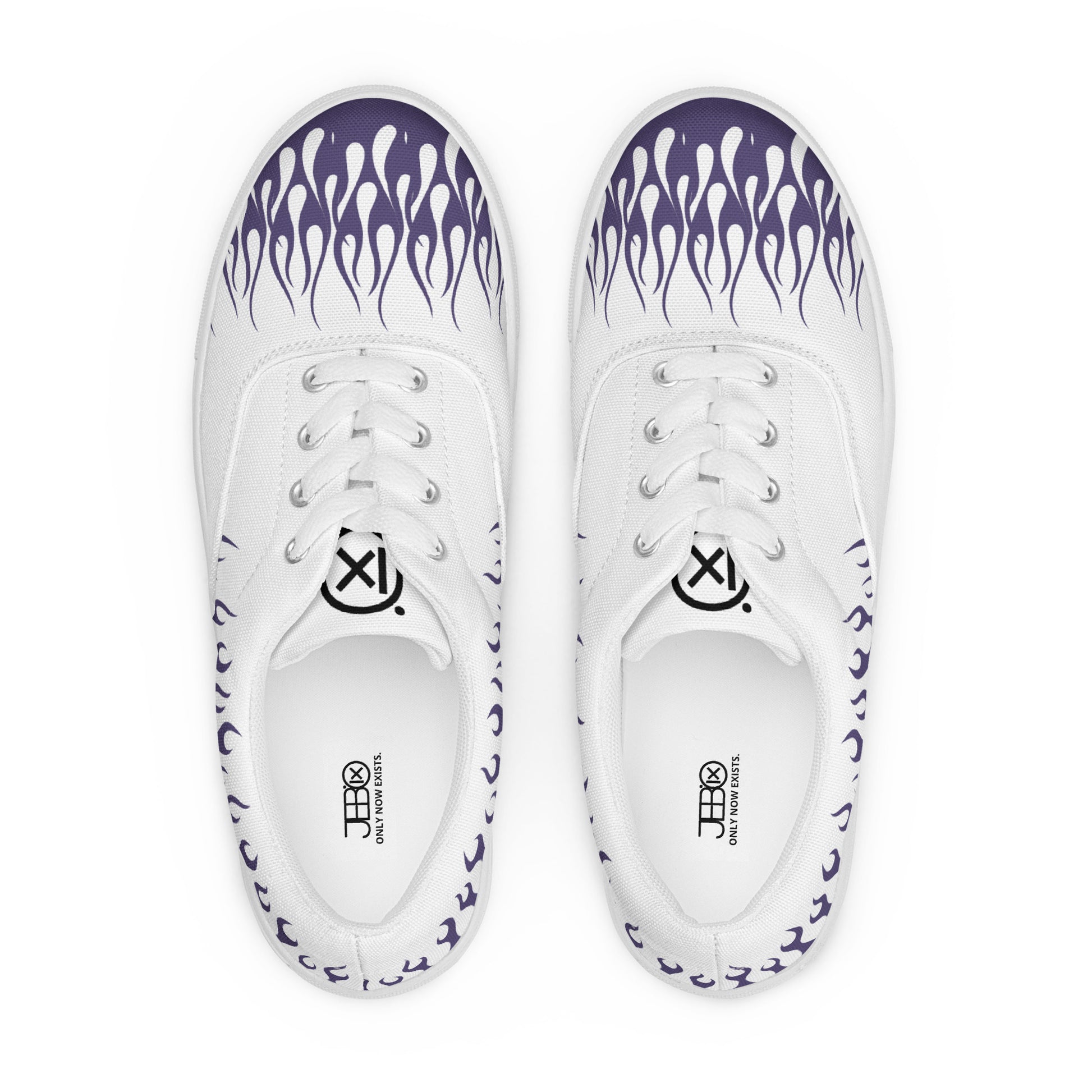 Pair of white canvas sneakers with violet flame pattern and white laces on black lining