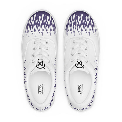 Pair of white canvas sneakers with violet flame pattern and white laces on black lining