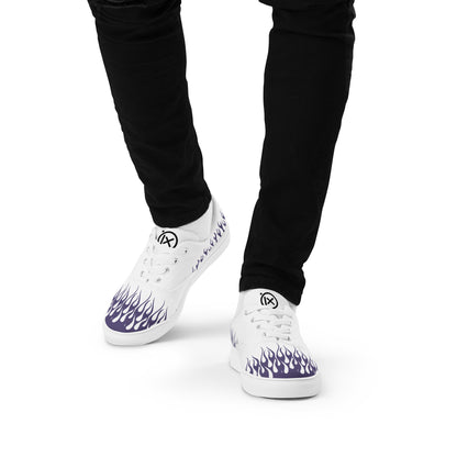 White canvas low-top sneakers with purple flame graphic, lace-up.