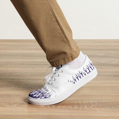 White canvas low-top sneakers with violet flame side print, white laces, black outsole.