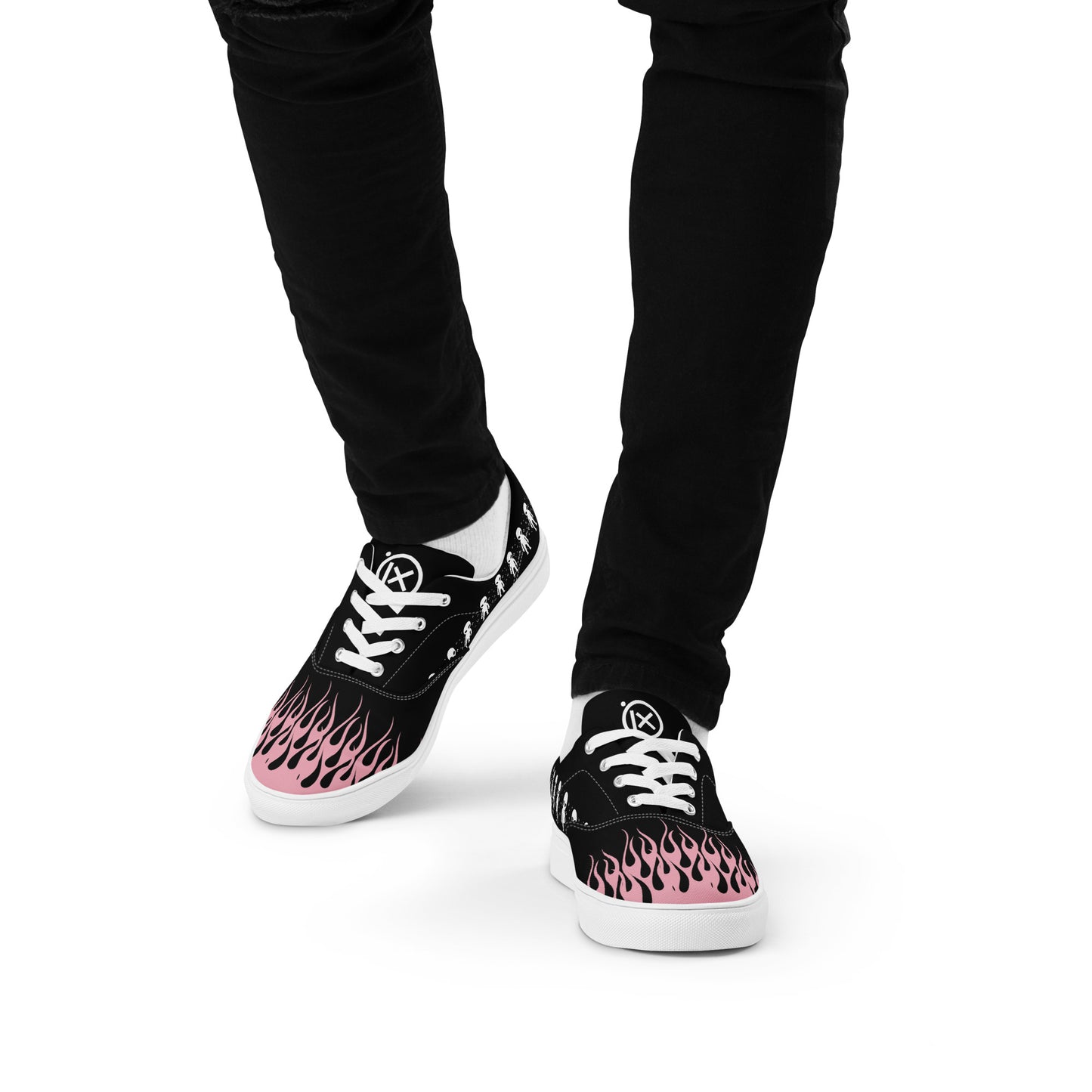 Black canvas sneaker with pink flame print, white laces, and white rubber sole
