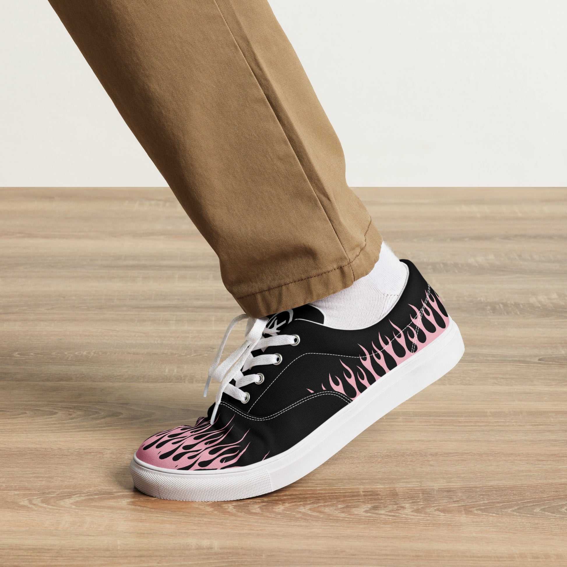Black canvas lace-up sneaker with pink flame side graphic and white sole
