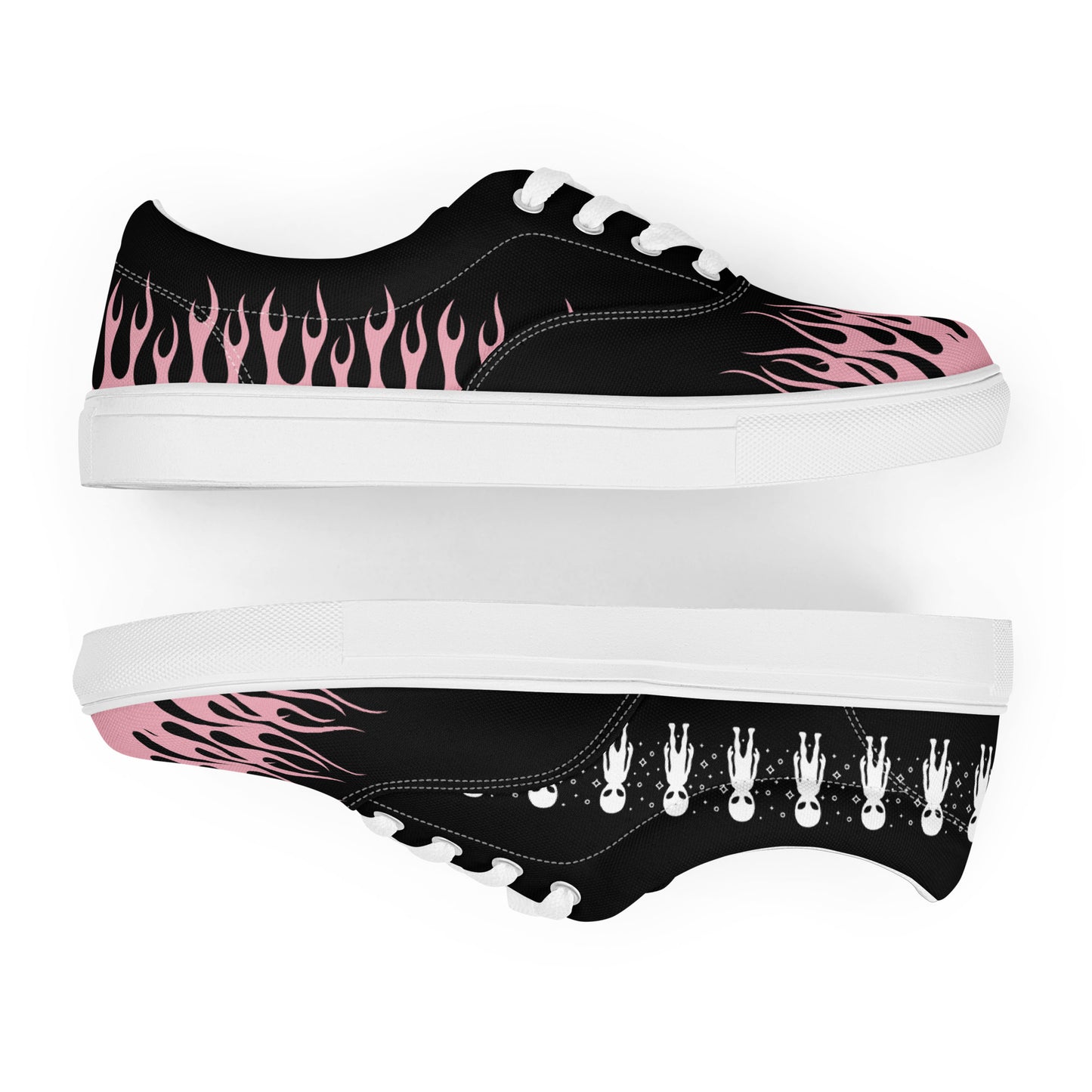 Black low-top sneakers with pink flame side panel, white midsole, character-print outsole