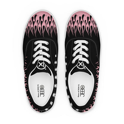 Black sneakers front view with pink flame upper, lace-up eyelets, white tongue label
